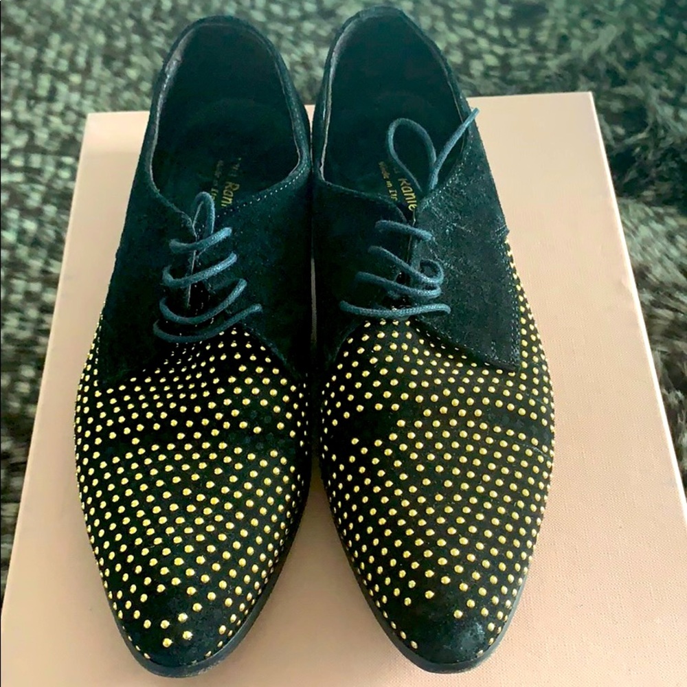 Black suede oxfords with gold appliqués